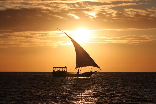 sea boat sunset