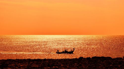 sea boat sunset
