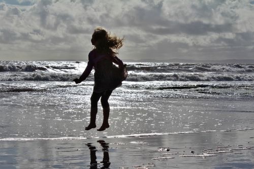 sea girl jumping in water water