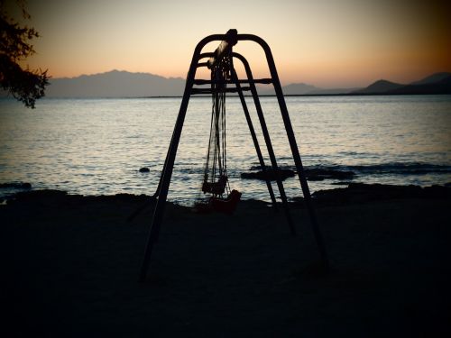 sea sunset swing