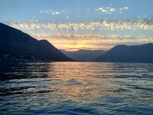 sea mountains clouds