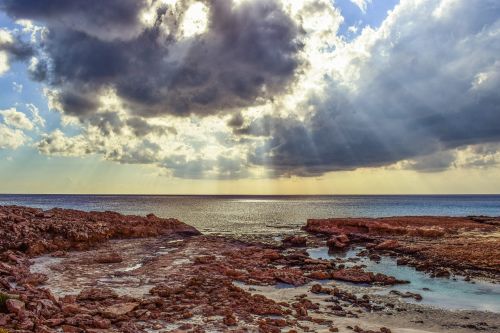 sea clouds sunlight