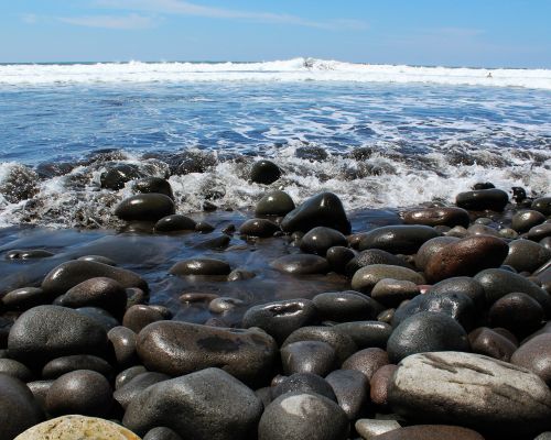 sea body of water rock