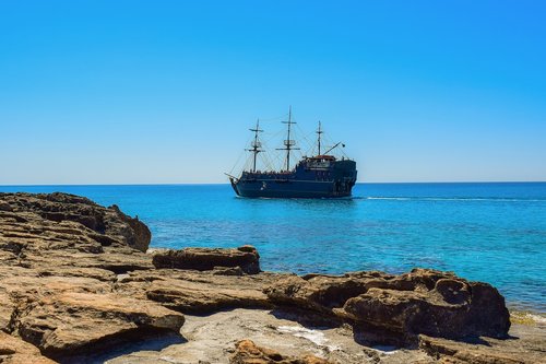 sea  rocky coast  boat