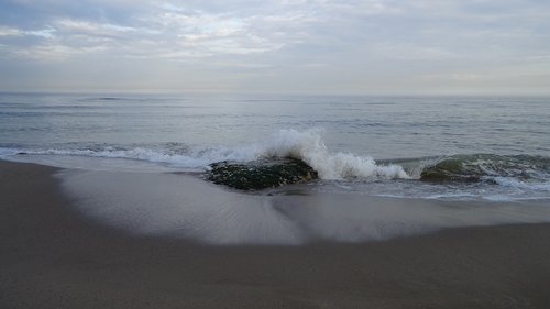 sea  rock  beach sand