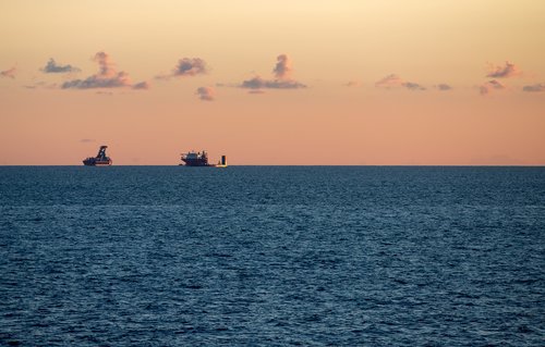 sea  boats  sunrise