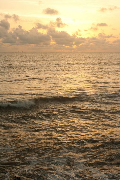 sea waves sunset