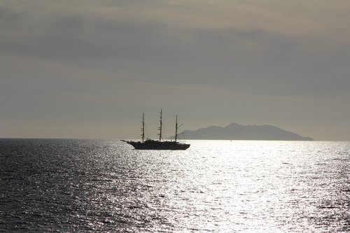 sea  sailing vessel  mirroring