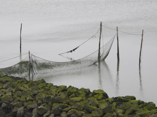 sea breakwater cloudy