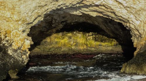 sea cave waves rocky coast