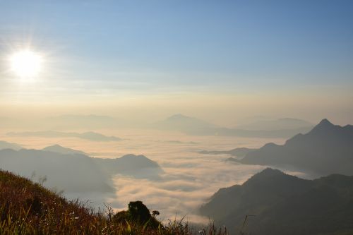 sea fog sky mountains