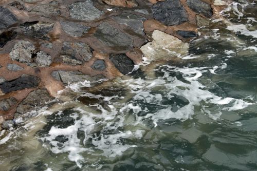 Sea Wave Brushing The Bank