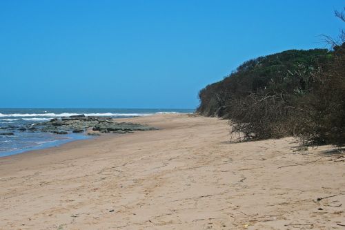 Sea With Blue Sky And Beach