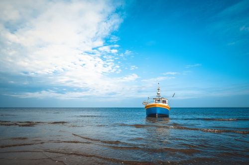 seashore fishing boat fishing