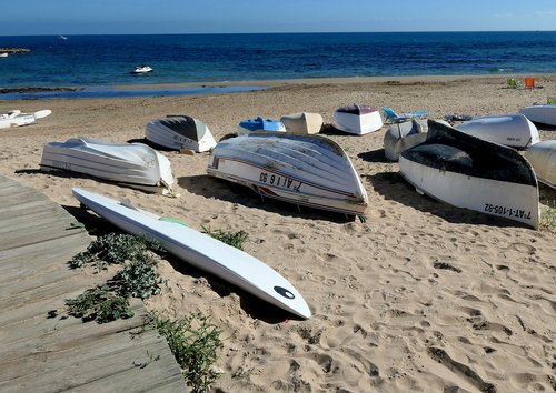 seaside  boats  surf board