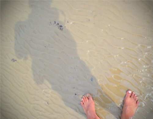 shadow beach feet