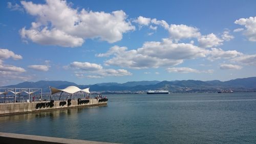 ships seaside blue sky