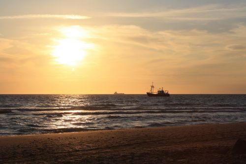 ships sunset north sea