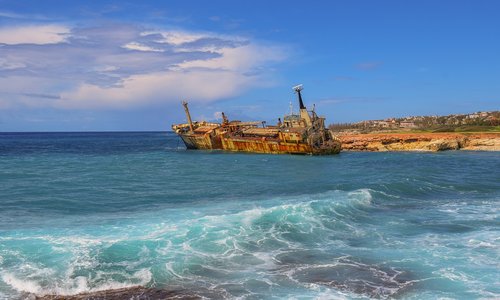 shipwreck  sea  clouds