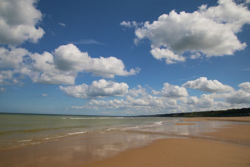 shore clouds sea