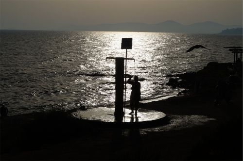 shower fountain sunset