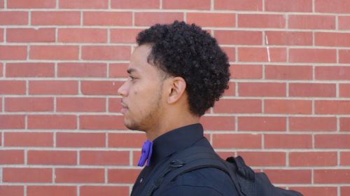 side profile black male student