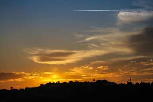 silhouette solar sunset