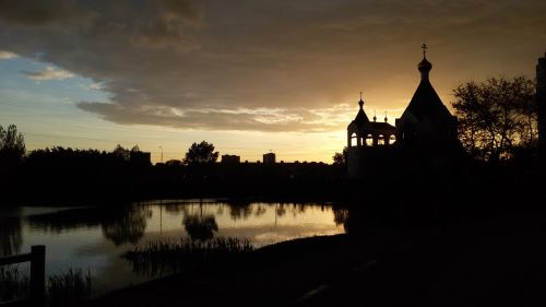 silhouette sunset church