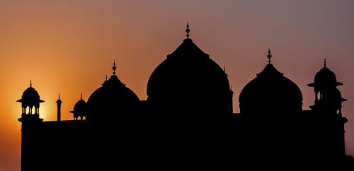 silhouettes sunset mosque
