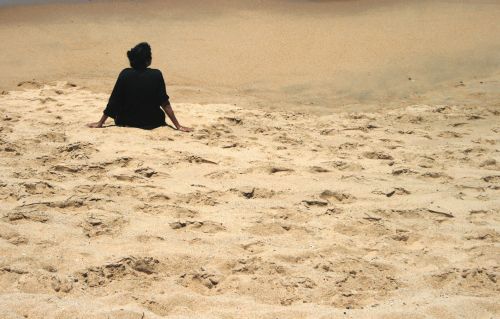 Single Figure On The Beach