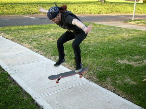 skateboarding skateboarder sidewalk