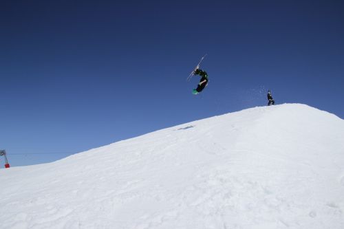 skiing artistic blue sky