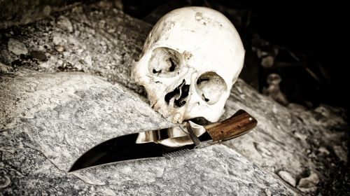 skull knife bone