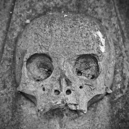 skull and crossbones tombstone mystical