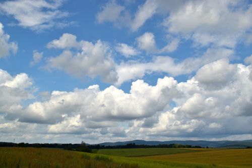 sky clouds field