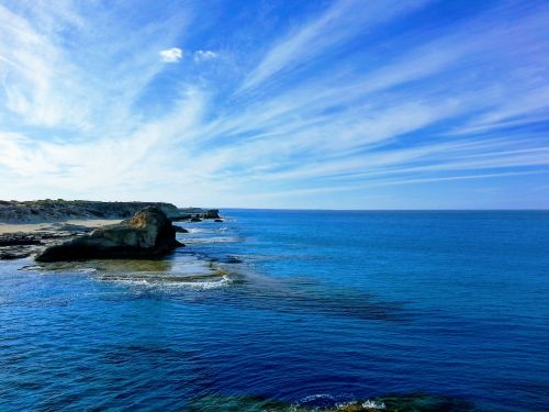 sky rocks sea