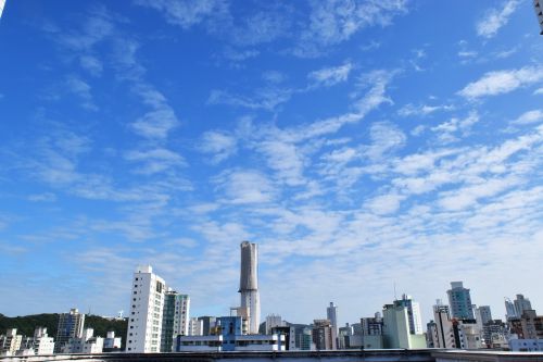 sky buildings clouds