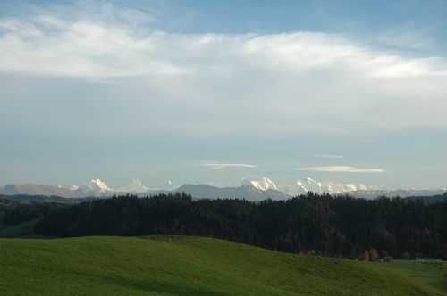 sky mountains clouds