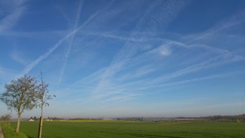 sky hazy chemtrails landscape