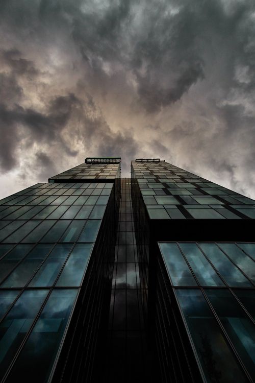 skyscraper windows cloudy