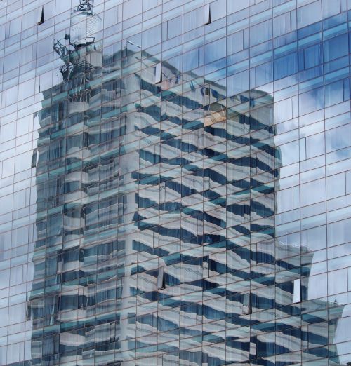 skyscraper mirroring mirror wall