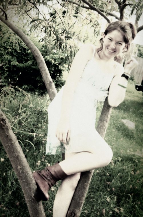 Smiling Girl In Tree (Faded)