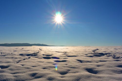 snow desert sun