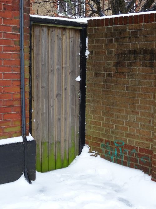 Snow Heaped Up Against Garden Door