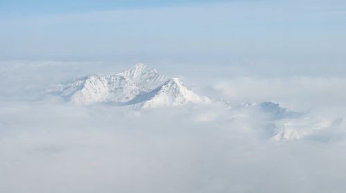 snow mountain aerial the yellow dragon