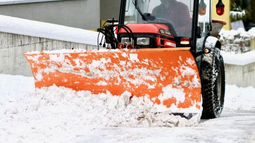 snow plowing plough tractor