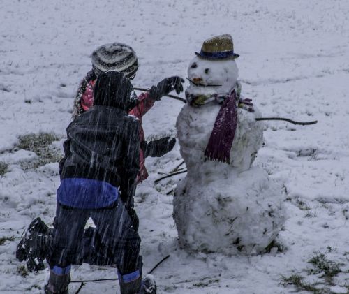 snowman snowing kids