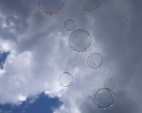 soap bubble  sky  clouds