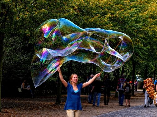 soap bubble giant bubble woman making soap bubbles