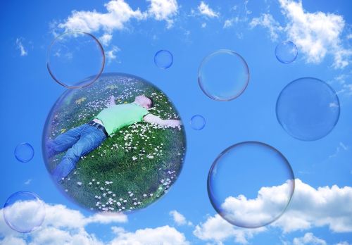 soap bubbles man clouded sky